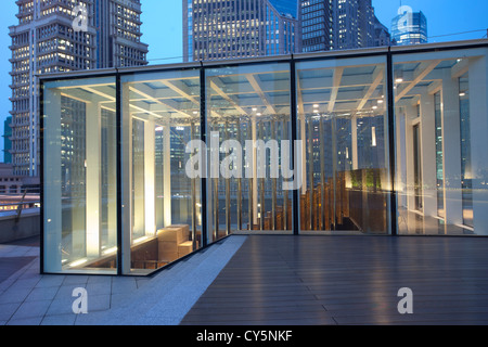 wooden plagform arounded by office building,lujiazui ,shanghai Stock Photo