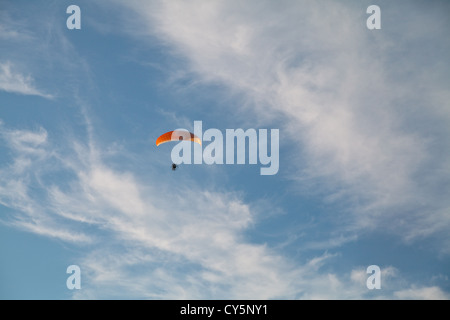 Powered paraglider flies over Marsden, Saskatchewan Stock Photo