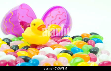 Yellow rubber duck & easter egg with jelly beans Stock Photo