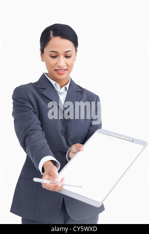 Close up of saleswoman asking for signature Stock Photo