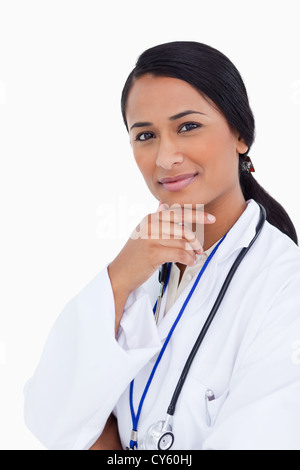 Close up of thoughtful female physician Stock Photo