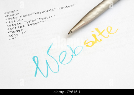 Website design concept with HTML script and ballpoint pen Stock Photo