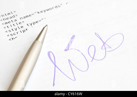 Website design concept with HTML script and ballpoint pen Stock Photo