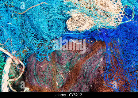 fishing nets pattern mess stacked at port in Mediterranean Stock Photo