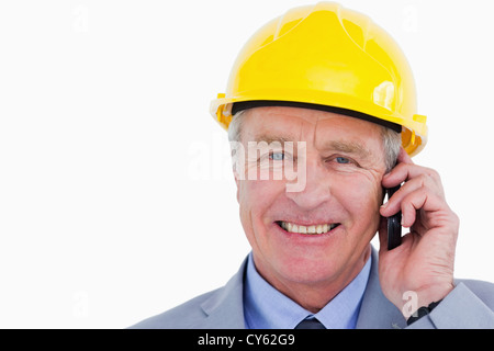 Smiling mature architect on the phone Stock Photo