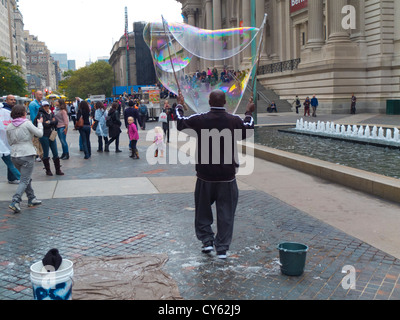 giant soap bubble outside the Metropolitan Museum of Art NYC Stock Photo