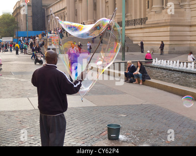 giant soap bubble outside the Metropolitan Museum of Art NYC Stock Photo