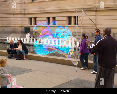 giant soap bubble outside the Metropolitan Museum of Art NYC Stock Photo