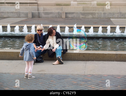 giant soap bubble outside the Metropolitan Museum of Art NYC Stock Photo