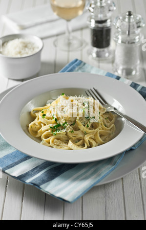 Fettucine Alfredo Pasta and cheese dish Stock Photo