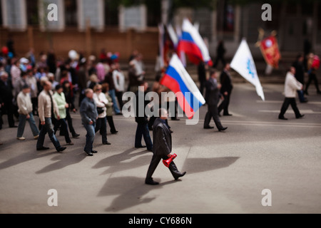 Samara,Russia-May 1, 2012: About 1000 people take a part in the communist demonstration in Samara ,Russia on Mayday, photo made Stock Photo