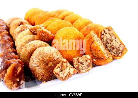 Dried fruits in tray isolated on white background. Stock Photo