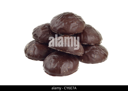 Marshmallows in chocolate cover stacked in pyramid isolated on white Stock Photo