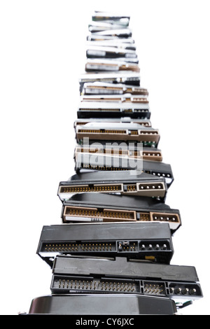 high stack of used hard drives in light background Stock Photo