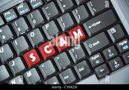Scam on keyboard Stock Photo