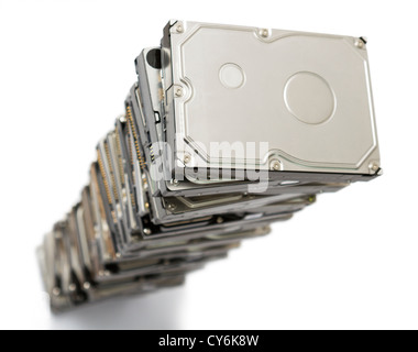 high stack of used hard drives in light background Stock Photo