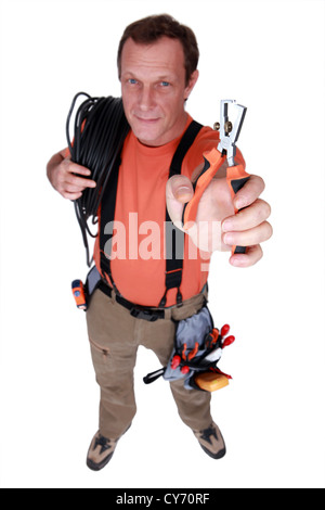 Electrician with specialist wire strippers Stock Photo