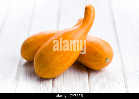 decorative pumpkins on white table Stock Photo
