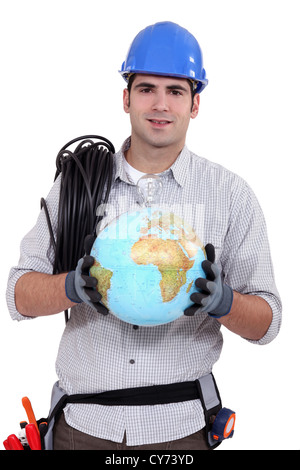 craftsman holding a globe Stock Photo