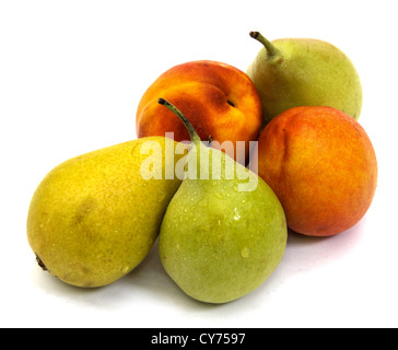 Two juicy nectarines and three pears isolated on a white background Stock Photo