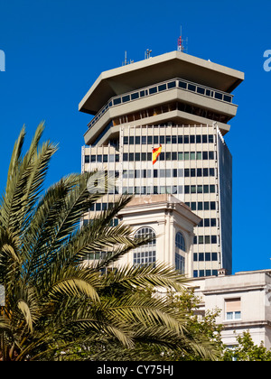 Typical modern and traditional buildings in Barcelona city centre Spain with blue sky and palm trees Stock Photo