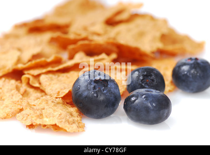 Crunchy bran cereal with fresh organic blueberries Stock Photo