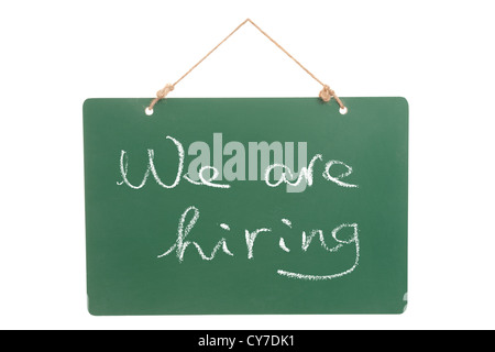We are hiring words written on green board Stock Photo
