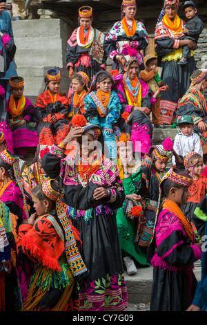 Kalash women and girls at the Grum Village Charso (dancing ground), Kalash Joshi (Spring Festival), Rumbur Valley, Chitral, Khyber-Pakhtunkhwa, Pakistan Stock Photo