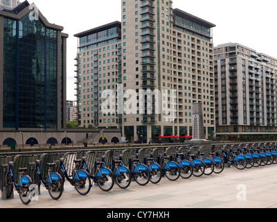 Rack of Barclays bicycles, Canary Wharf London United Kingdom. Stock Photo