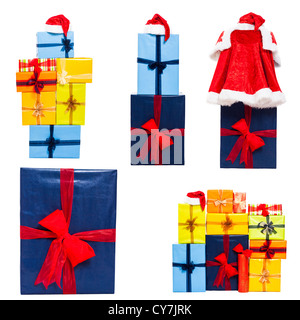 Collection of many colorful Christmas gift boxes and Santa costume, isolated on white background. Stock Photo