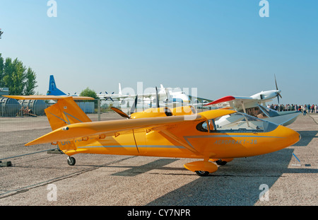 Light two-engine airplane for cruising and training on yellow colour - general view. Stock Photo