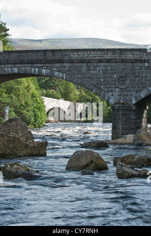 Old Brig O' Dee bridge. Over the River Dee downstream of Braemar in Aberdeenshire, Scotland Stock Photo