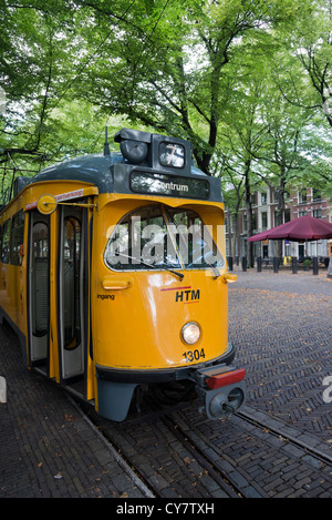 A traditional city centre Dutch yellow tram at Lange Voorhout in the Hague (Den Haag) Netherlands Stock Photo