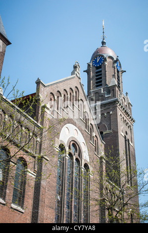 Clock tower of the historic Remonstrant Church (1895) in Rotterdam, Netherlands. Stock Photo
