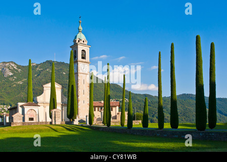 ALLEY OF CYPRESSES, SANT ABBONDIO CHURCH IN GENTILINO, NEAR MONTAGNOLA, LUGANESE, TICINO, SWITZERLAND Stock Photo