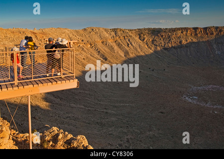 Family on Observation deck above Meteor Crater, also known as Barrenger Crater, near Winslow, Arizona Stock Photo
