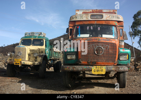 Battered vintage Indian Tata trucks in Rajasthan, India Stock Photo