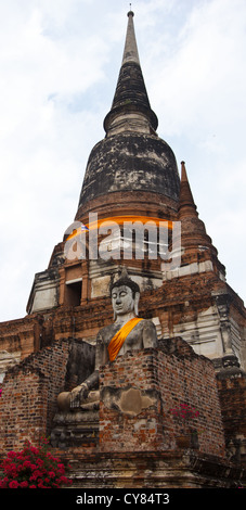 image of old pagoda and Buddha statue, Wat Yai Chaimongkol, Ayutthaya, Thailand Stock Photo