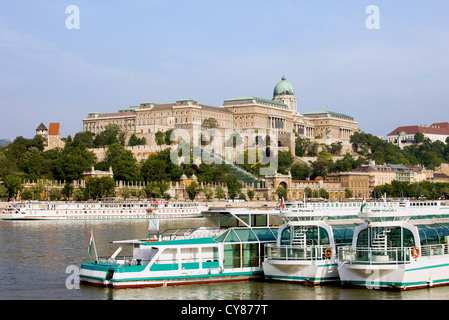 Passenger boats on the Danube River and Buda Castle in Budapest, Hungary. Stock Photo