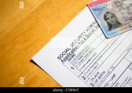 United States Social Security Number Application with Employment Authorization Card on top Stock Photo