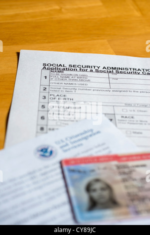 USCIS work permit permit and Social Security Administration form Stock Photo