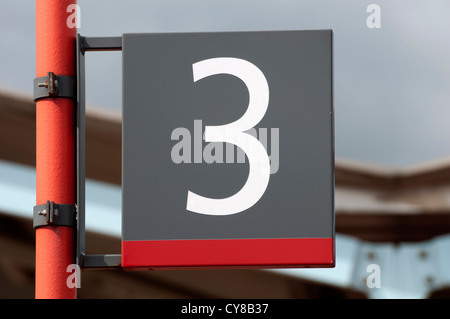 Platform 3 sign on railway station Stock Photo