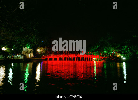 Huc Bridge at Hoan Kiem Lake in Hanoi in Vietnam in Far East Southeast Asia. Red Night Nightfall Dark History Surrealism Serenity Wanderlust Travel Stock Photo