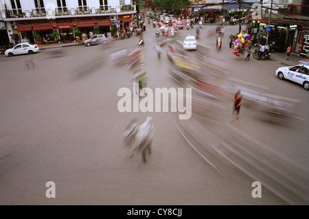 Traffic motion in the Old City of Hanoi in Vietnam in Far East Southeast Asia. Rush Speed Inspiration Commotion Street Scene Transport Travel Stock Photo