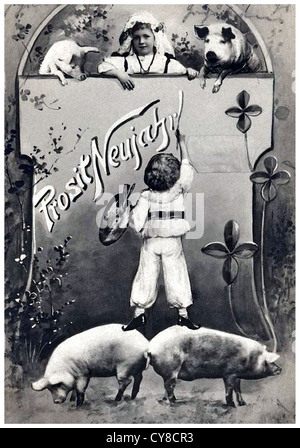 Boy stands on two pigs Stock Photo
