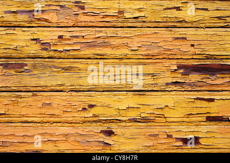 old painted in yellow wooden wall Stock Photo