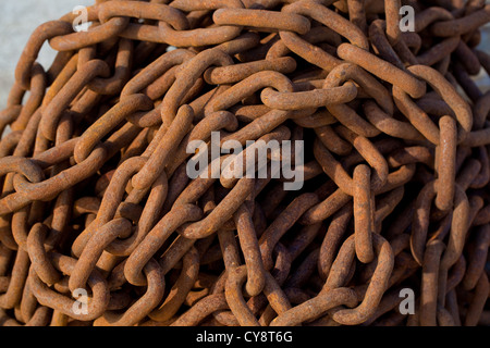 Rusty chain on key side. Iona. West coast Scotland. Stock Photo