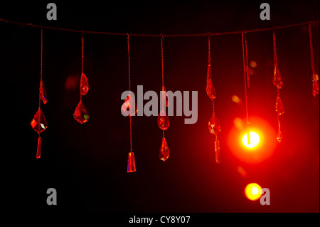 Crystal prisms sparkling in reddish light Stock Photo