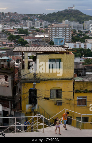 View from Baiana hill in the Complexo do Alemão Favela, with Penha Church in the background, Rio de Janeiro Brazil Stock Photo