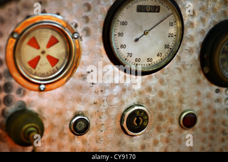 Vintage dash board with speedometer, on an old car Stock Photo